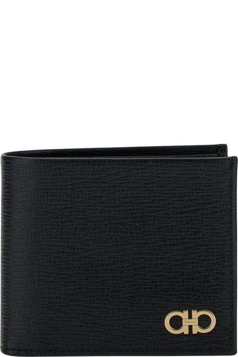 Ferragamo Wallets for Men Ferragamo Black Gancini Bi-fold Wallet In Leather Man Ferragamo