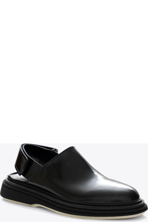 Loafers & Boat Shoes for Men The Antipode Sabot Cinturino In Pelle Di Vitello Abrasivato Black polished leather sabot with back strap - Vicotr 148