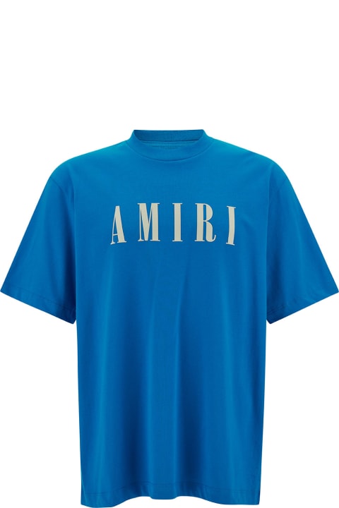 Topwear for Men AMIRI Light Blue T-shirt With Contrasting Logo Print In Cotton Man