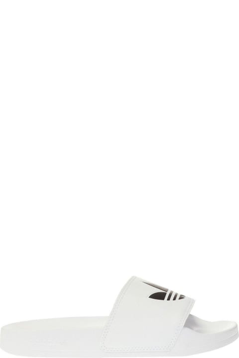 ウィメンズ Adidasのフラットシューズ Adidas Adilette Lite Slip-on Slides