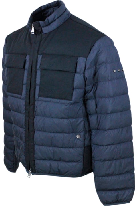 100 Gram Down Jacket With High Quality Feathers. Technical Fabric Details And Chest Pockets. The Closure Is With Zip