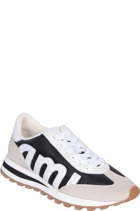 Ami Alexandre Mattiussi Shoes for Men Ami Alexandre Mattiussi Ami Rush Leather And Canvas Sneakers In Black And Ivory