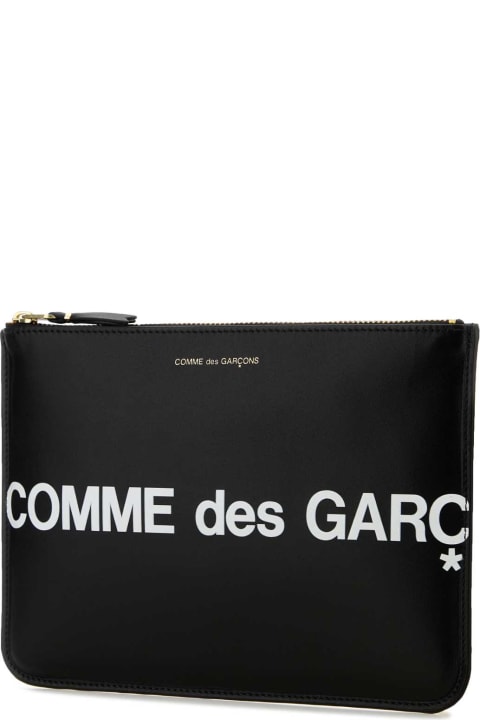 ウィメンズ Comme des Garçonsの財布 Comme des Garçons Black Leather Pouch