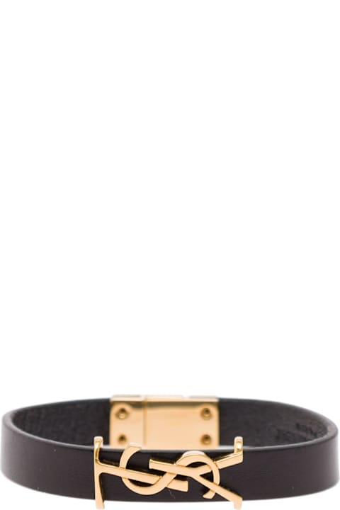 أساور لـ السيدات Saint Laurent Black Bracelet With Golden Logo In Leather Woman Saint Laurent