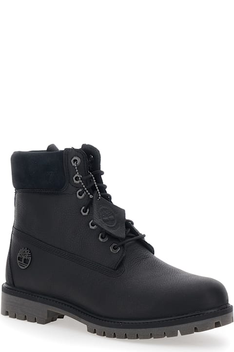 Homeware Timberland Black Ankle Boots With Logo Detail On The Side And Low Block Heel In Leather Man