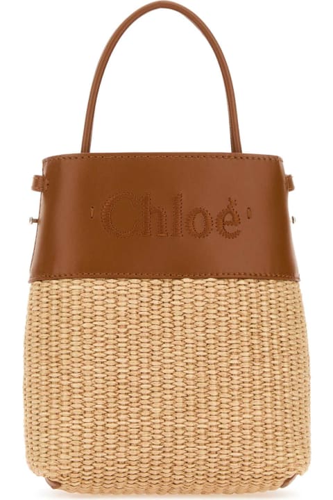ウィメンズ Chloéのトートバッグ Chloé Bicolor Raffia And Leather Micro Handbag