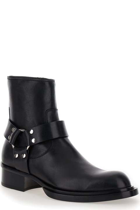 メンズ Alexander McQueenのブーツ Alexander McQueen Black Ankle Boots With Harness Detail In Leather Man