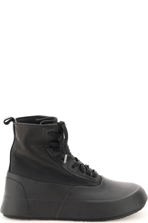 Rubber And Leather Hi-top Sneakers
