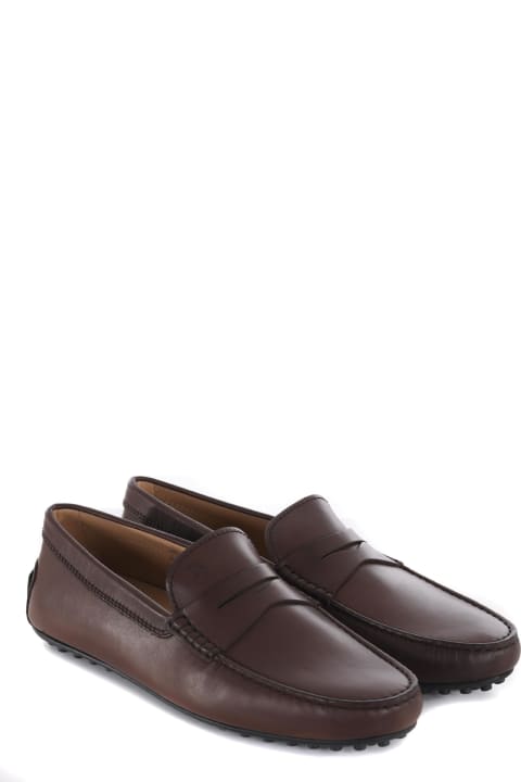 Tod's Loafers & Boat Shoes for Men Tod's Logo Engraved Loafers