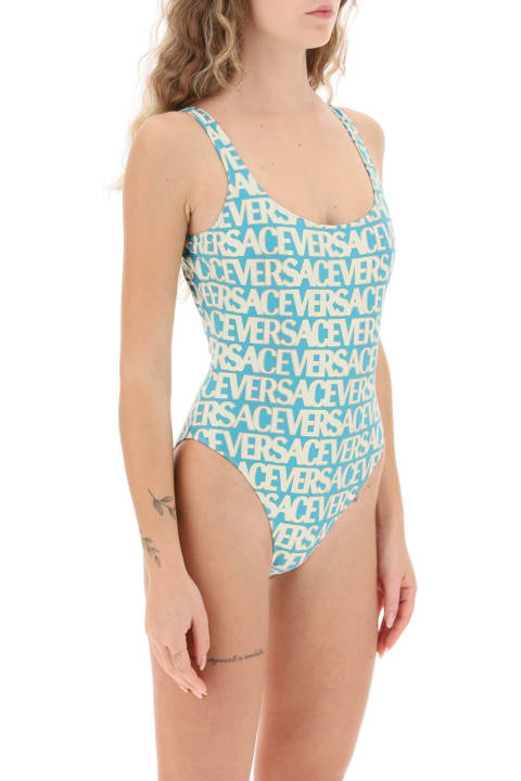ウィメンズ Versaceの水着 Versace Blue One-piece Swimsuit With All-over Logo Lettering Print In Stretch Tech Fabric Woman