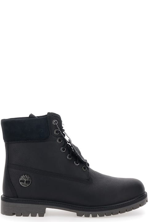 Homeware Timberland Black Ankle Boots With Logo Detail On The Side And Low Block Heel In Leather Man