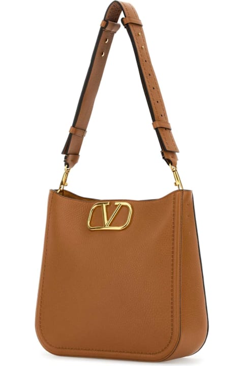 Valentino Garavani Totes for Women Valentino Garavani Camel Leather Vlogo Crossbody Bag