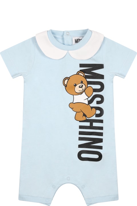 Moschino Clothing for Baby Boys Moschino Light Blue Romper For Baby Boy With Teddy Bear And Logo