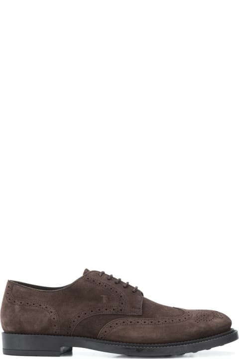 Tod's Loafers & Boat Shoes for Men Tod's Classic Perforated Derby Shoes