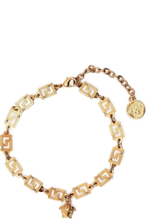 Greca Bracelet With Medusa Charm In Gold-tone Brass Man