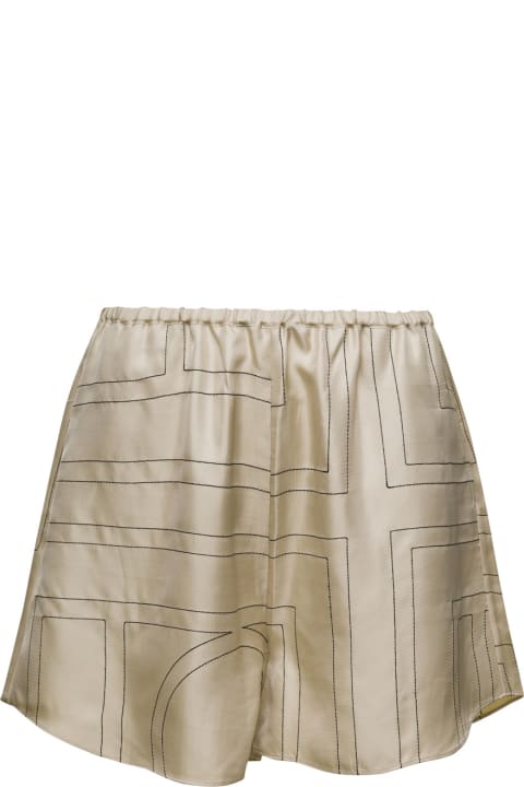 Totême for Women Totême Beige Shorts With Geometric Logo Print In Silk Woman