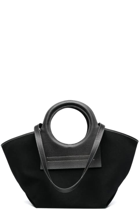 Cala Small Grainy Black Tote Handbag In Calf Leather And Canvas With White Contrast Stitching