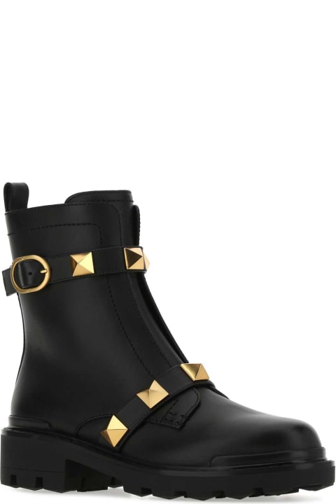 Boots for Women Valentino Garavani Black Leather Roman Stud Ankle Boots