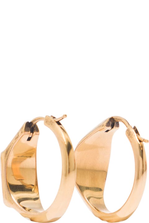 Gold-colored Hoops Earrings With Skull And Logo Engraved In Brass Woman