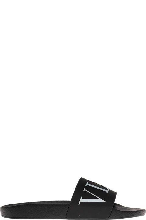 Valentino Garavani Man's Black Rubber Slide Sandals With Logo