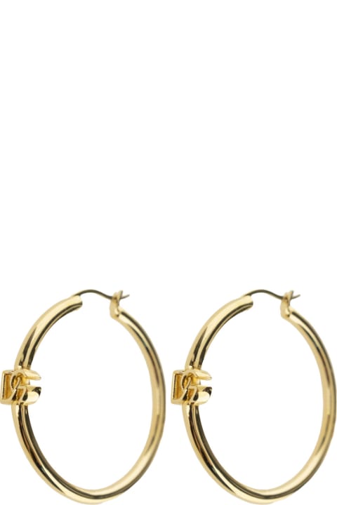 ウィメンズ Dolce & Gabbanaのイヤリング Dolce & Gabbana Gold Colored Creole Earrings With Dg Logo In Brass Woman