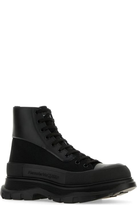 メンズ Alexander McQueenのシューズ Alexander McQueen Black Canvas And Leather Boxer Ankle Boots