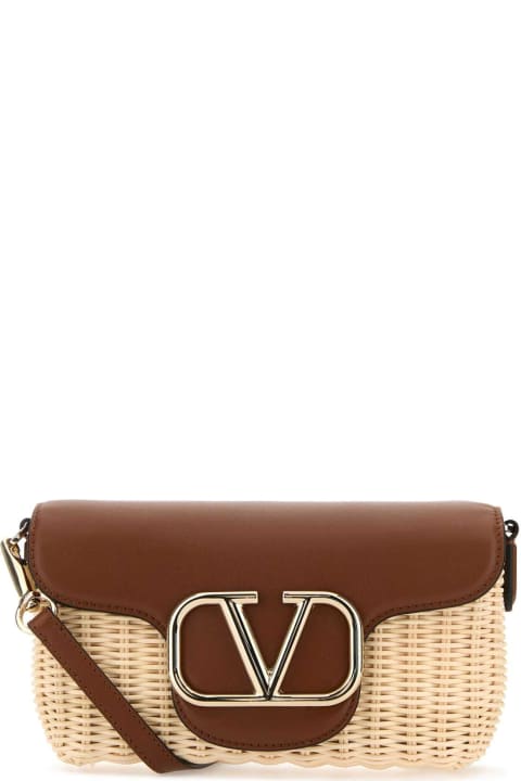 Valentino Garavani Bags for Women Valentino Garavani Two-tone Leather And Raffia Crossbody Bag