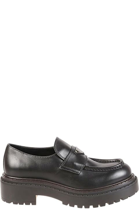 Prada Loafers & Boat Shoes for Men Prada Logo Plaque Almond-toe Loafers