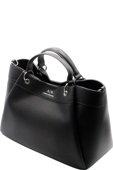 Handbag And Shoulder Bag Made Of Soft Faux Leather With Closure Button And Front Logo. Internal Pockets.