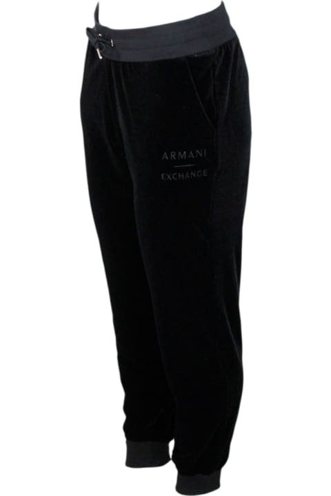Stretch Jogging Trousers With Drawstring And Elastic Waistband Made Of Soft Chenille. Logo On The Leg