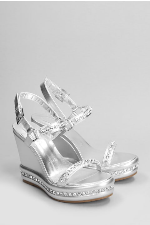 Christian Louboutin Sandals for Women Christian Louboutin Pyrastrass 110 Wedges In Silver Leather