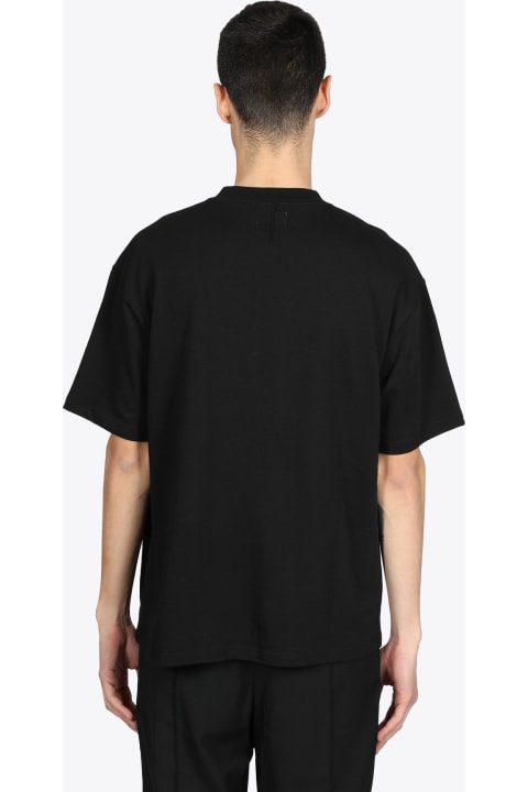 Daisy T-shirt Black cotton t-shirt with daisy print