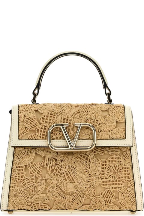 Bags for Women Valentino Garavani Biege Raffia Vsling Handbag