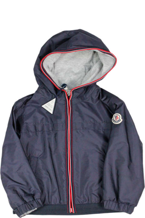 Coats & Jackets for Boys Moncler Windproof Jacket In Technical Fabric With Hood And Cotton Lining. Colored Profile On The Zip And Hood