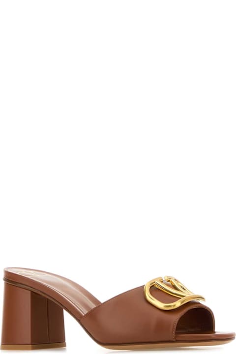 Valentino Garavani for Women Valentino Garavani Caramel Leather Vlogo Mules