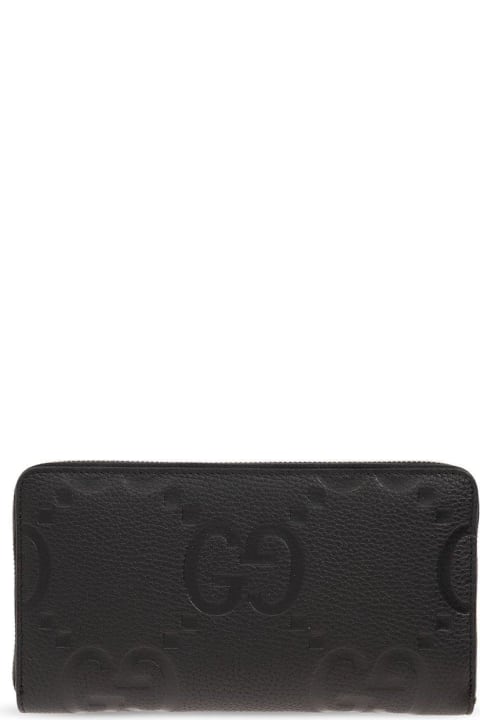 メンズ Gucciの財布 Gucci Logo Embossed Zip-around Wallet