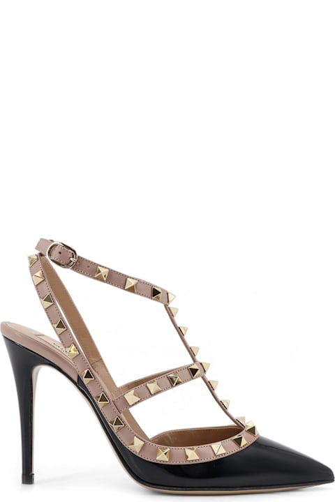 Valentino Garavani Rockstud Patent Leather Pumps With Iconic Studs