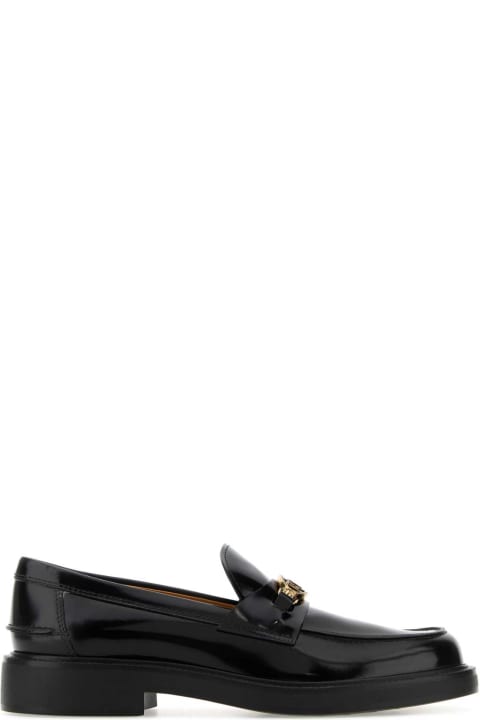 Tod's Flat Shoes for Women Tod's Black Leather Loafers