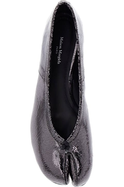 Maison Margiela 
mirror Tabi Baller