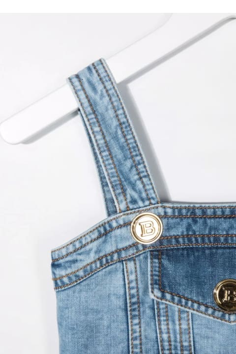 Kids Short Dungarees In Light Blue Denim With Golden Embossed Buttons