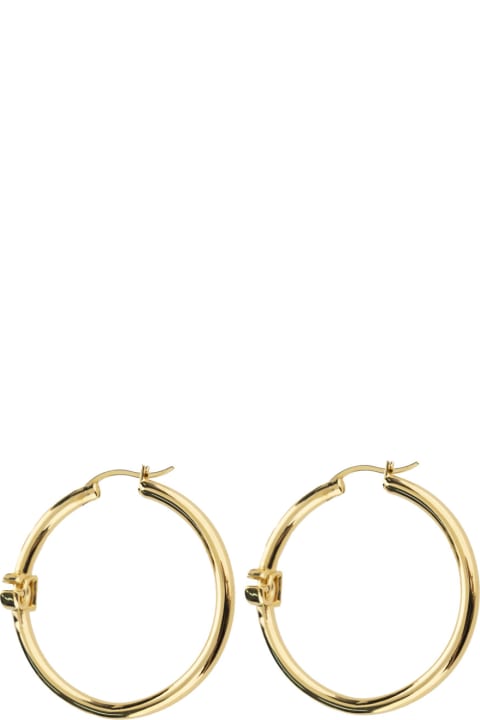 ウィメンズ Dolce & Gabbanaのイヤリング Dolce & Gabbana Gold Colored Creole Earrings With Dg Logo In Brass Woman