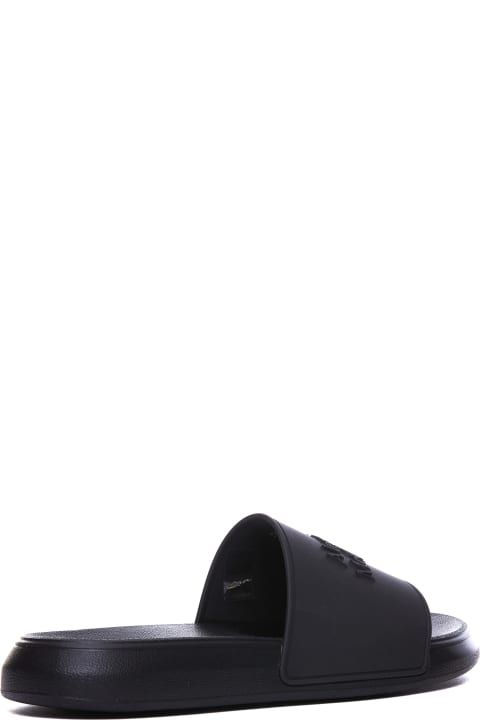 ウィメンズ Alexander McQueenのシューズ Alexander McQueen Logo Slide Sandals