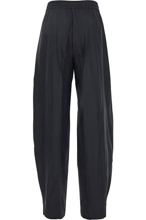 The Andamane سراويل طويلة وقصيرة لـ السيدات The Andamane Black Pants With Cannon Pleats And Elastic Waist With Drawstring In Cotton Blend Woman