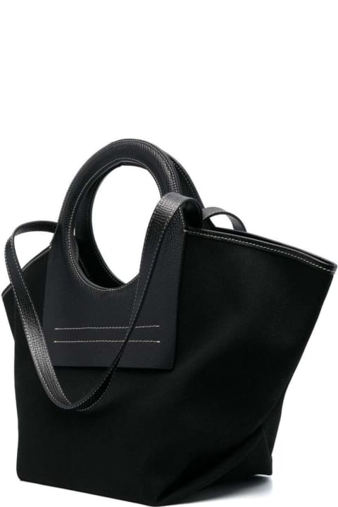 Cala Small Grainy Black Tote Handbag In Calf Leather And Canvas With White Contrast Stitching