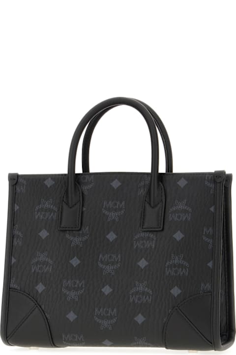 MCM Totes for Women MCM Printed Synthetic Leather Small Munchen Handbag