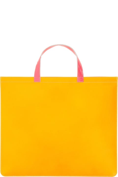 ウィメンズ Comme des Garçons Walletのトートバッグ Comme des Garçons Wallet Super Fluo Leather Tote Bag