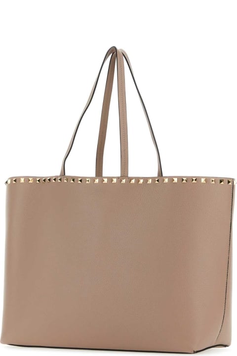 Valentino Garavani Bags for Women Valentino Garavani Antiqued Pink Leather Rockstud Shopping Bag