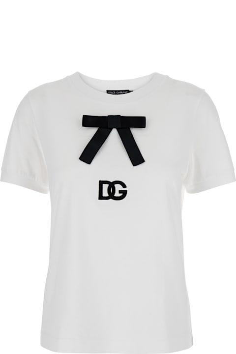 ウィメンズ Dolce & Gabbanaのトップス Dolce & Gabbana White T-shirt With Bow On The Front And Dg Logo In Cotton Woman