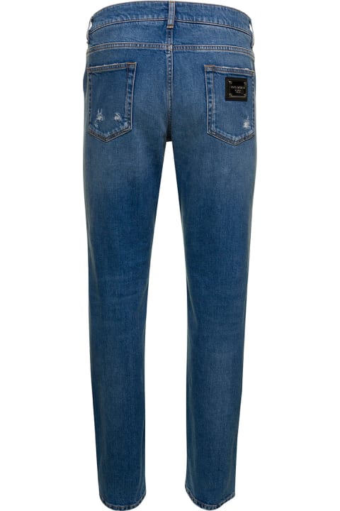 Light Blue Five-pockets Slim Jeans With Logo Plaque In Stretch Cotton Denim Man