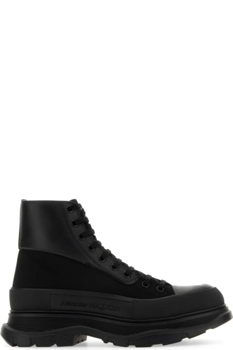 メンズ Alexander McQueenのブーツ Alexander McQueen Black Canvas And Leather Boxer Ankle Boots